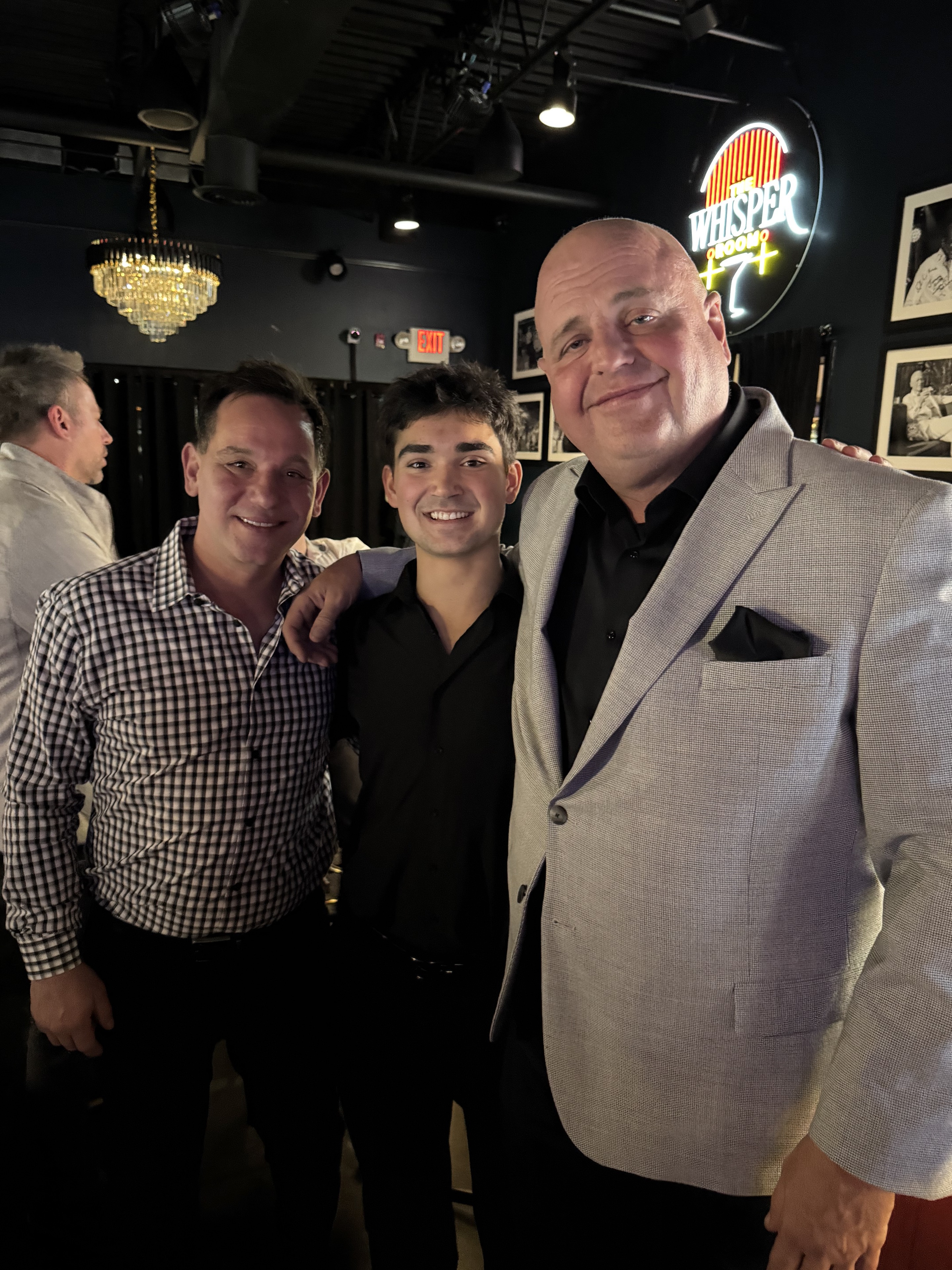 A photograph with family friends at Johnny Cabs. A personal moment, not a client endorsement.